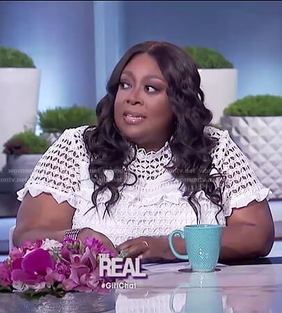 Loni’s white lace ruffle top on The Real