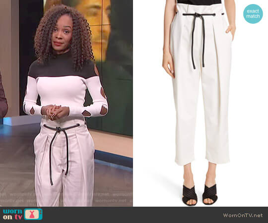 WornOnTV: Zuri’s white color-block cutout sleeve top and belted pants ...