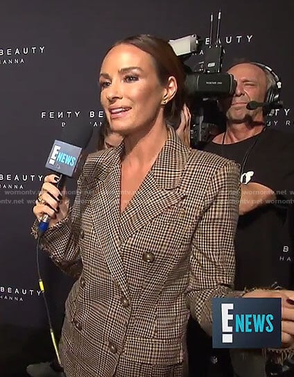 Catt’s brown plaid suit on E! News