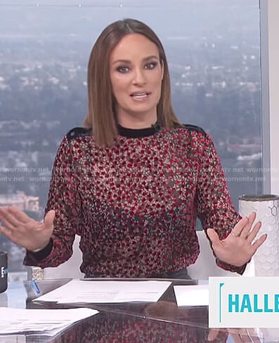 Catt’s red dotted top on E! News Daily Pop