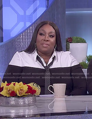 Loni's black layered blouse and checked pants on The Real