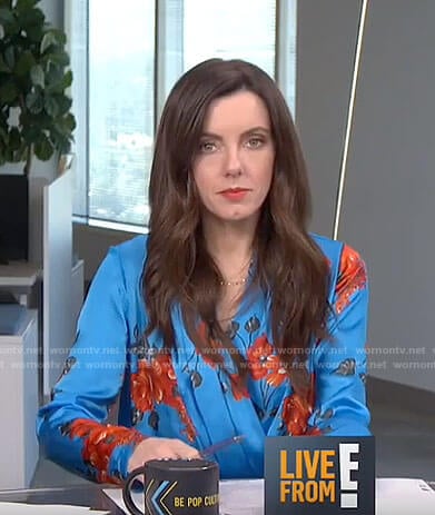 Melanie’s blue floral cross top on Live from E!