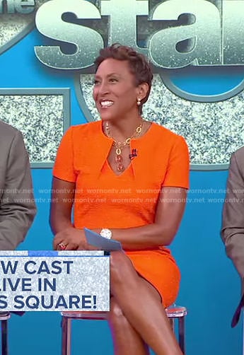 Robin’s orange folded neck dress on Good Morning America