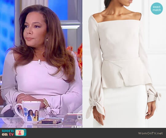 Wicklow knotted textured-crepe peplum top by Roland Mouret worn by Sunny Hostin on The View