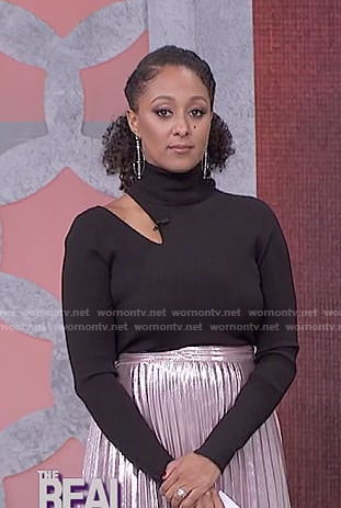 Tamera’s black cutout turtleneck top on The Real