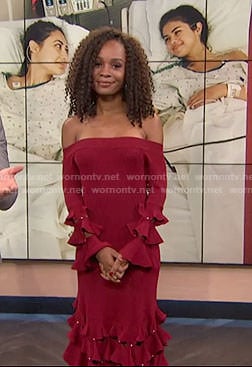 Zuri’s red off-shoulder ruffled dress on E! news