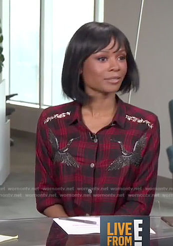 Zuri’s red plaid stork shirt on Live from E!
