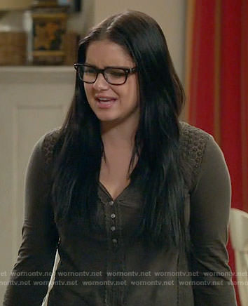 Alex's dark green henley top with lace shoulders on Modern Family