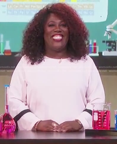 Sheryl's pink ribbon sleeve top on The Talk