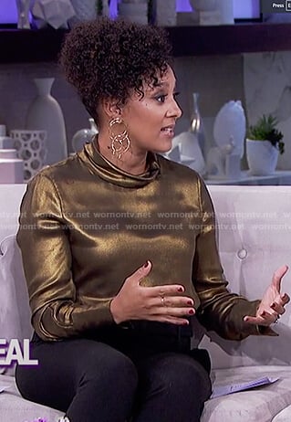 Tamera’s gold metallic long sleeved top on The Real