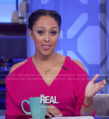 Tamera’s pink cold shoulder waist tie dress on The Real