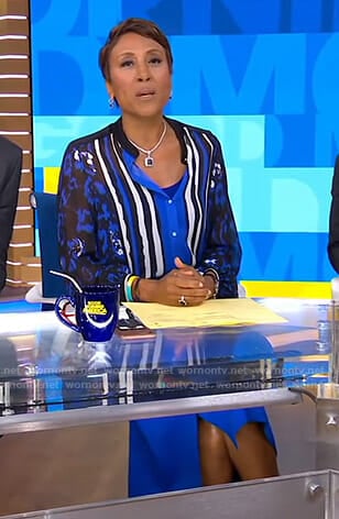 Robin’s blue mixed print blouse and wrap skirt on Good Morning America