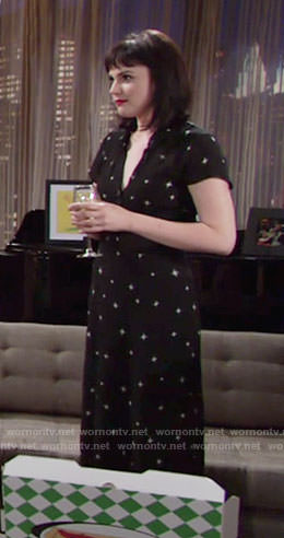 Tessa’s black star print midi dress on The Young and the Restless
