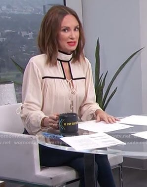 Catt’s white contrast tie blouse on E! News Daily Pop