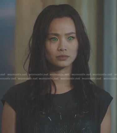 Clarice's black unrivalled cat graphic top on The Gifted