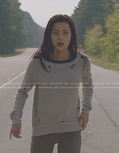 Clarice’s grey distressed sweatshirt on The Gifted