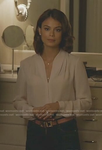 Cristal’s white gathered v-neck blouse on Dynasty