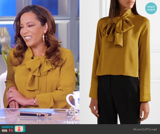 Dawn pussy-bow satin-crepe blouse by Khaite worn by Sunny Hostin on The View