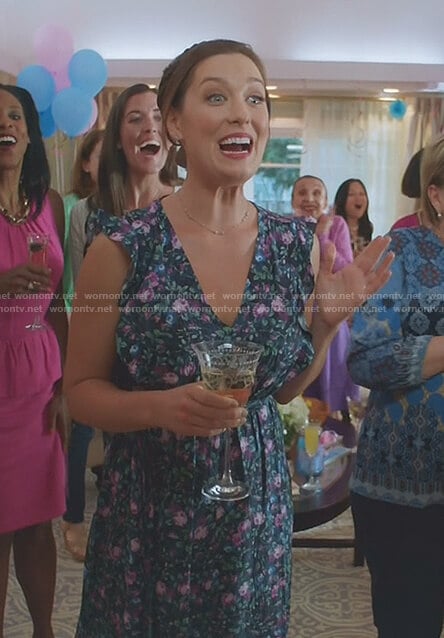 Katie’s navy floral v-neck dress on Great News