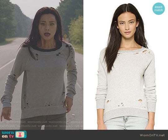 'Annie' Destroyed Sweatshirt by Pam & Gela worn by Clarice Fong (Jamie Chung) on The Gifted