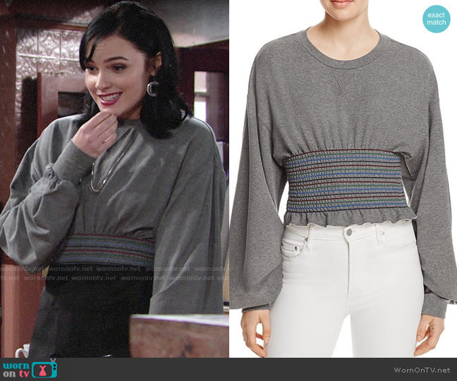 Petersyn Cory Smocked Sweatshirt worn by Tessa Porter (Cait Fairbanks) on The Young and the Restless