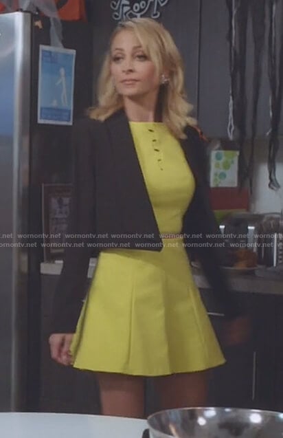 Portia's yellow a-line dress with cutouts on Great News