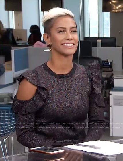 Sibley’s glitter cold-shoulder ruffle top on Live from E!