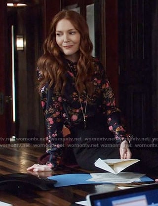 Abby’s black floral blouse on Scandal