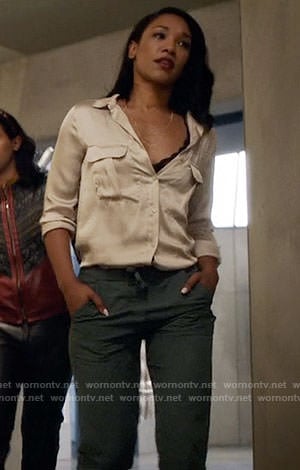 Iris's beige shirt with front pockets on The Flash