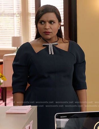 Mindy's black cutout top with diamante bow and red skirt on The Mindy Project