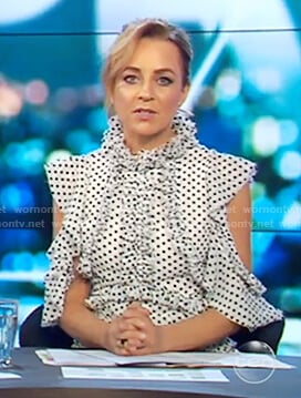 Carrie’s polka dot ruffle front dress on The Project