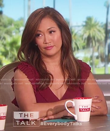 Carrie Inaba’s red ruffle wrap dress on The Talk