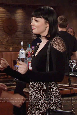 Tessa’s black lace-shoulder top and leopard print pants on The Young and the Restless