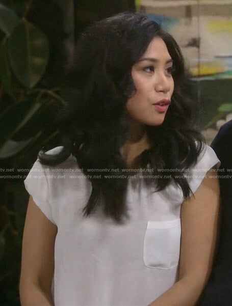 Eve's white front pocket short sleeve top on 9JKL