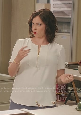 Rebecca’s white zip front top on Crazy Ex-Girlfriend