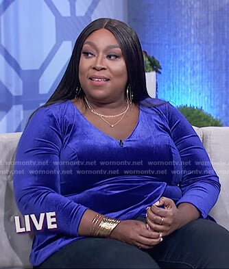 Loni’s blue velvet peplum top on The Real