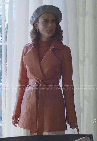 Cristal's orange ribbed sweater and leather coat on Dynasty