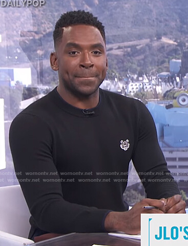 Justin’s black tiger patch sweater on E! News Daily Pop