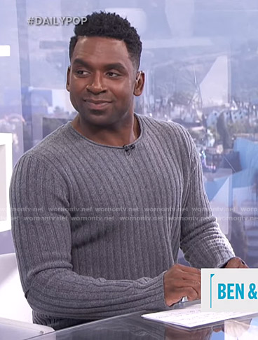 Justin’s grey ribbed cutout sleeve sweater on E! News Daily Pop