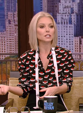 Kelly’s black heart print tie blouse on Live with Kelly and Ryan