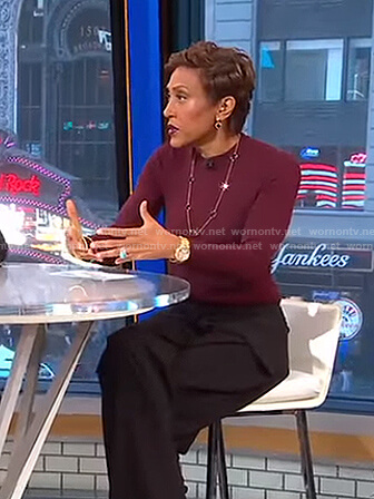Robin’s red mock neck top and black wrapped pants on Good Morning America