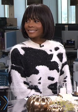 Zuri’s cow print fluffy sweater on Live from E!