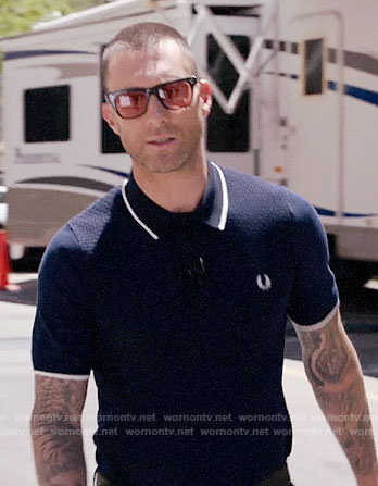 Adam Levine’s navy polo shirt with white trim on The Voice