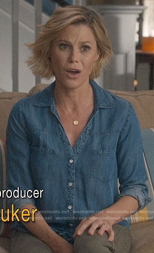 Claire's denim button front shirt on Modern Family