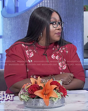 Loni’s red embroidered floral keyhole top on The Real