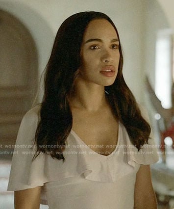 Erica's white ruffled top on Last Man on Earth