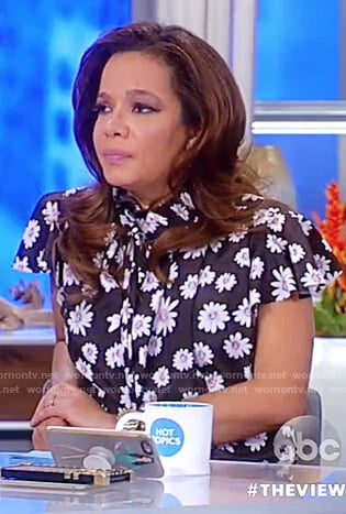Sunny's black floral print tie neck top on The View