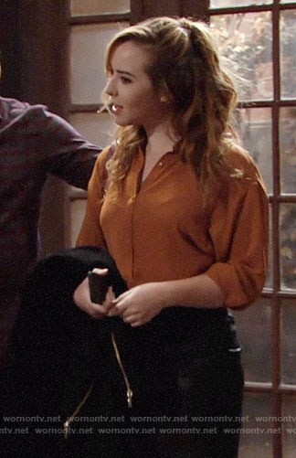 Mariah’s orange button front top on The Young and the Restless