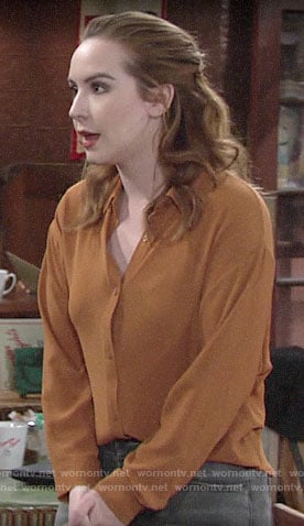 Mariah’s orange button front top on The Young and the Restless