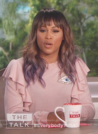 Eve's pink embroidered eye ruffle sweater on The Talk